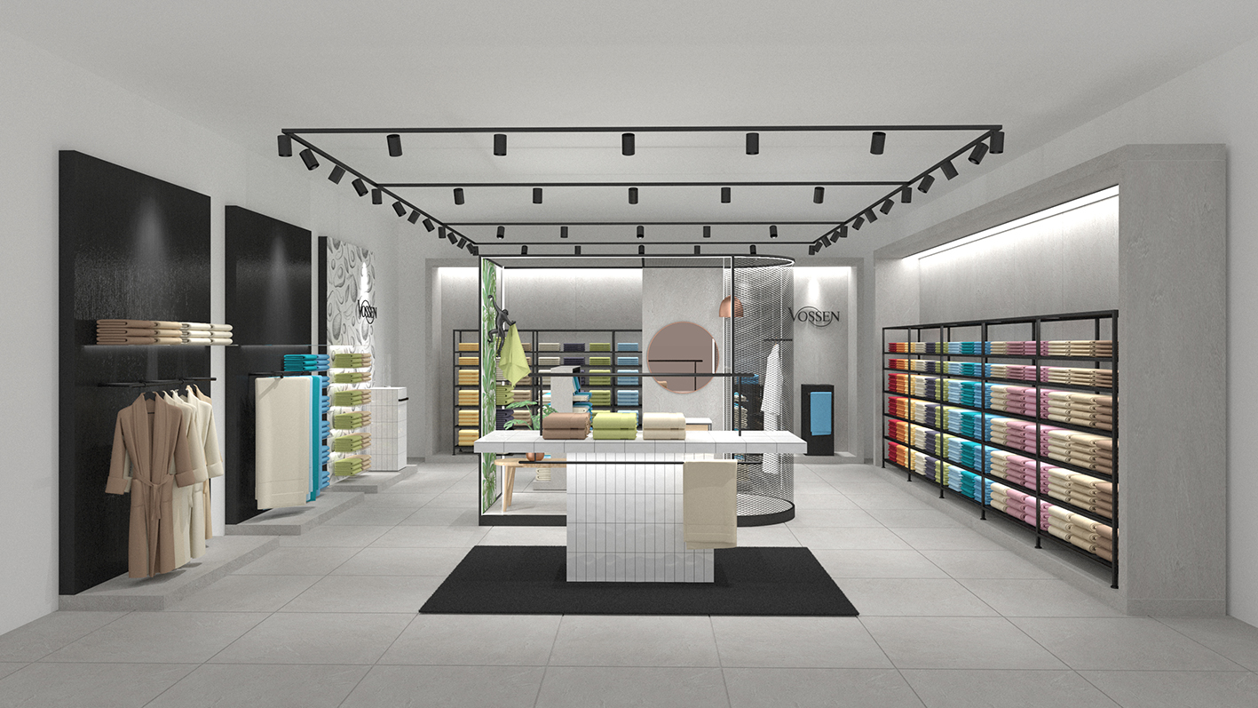 Modernes Ladenkonzept von Vossen mit minimalistischer Gestaltung, offener Raumstruktur und deckenmontierten Spotlights. Präsentation farbenfroher Handtücher auf klaren Regalsystemen und zentralem Tisch – Fokus auf Funktionalität und Ästhetik.